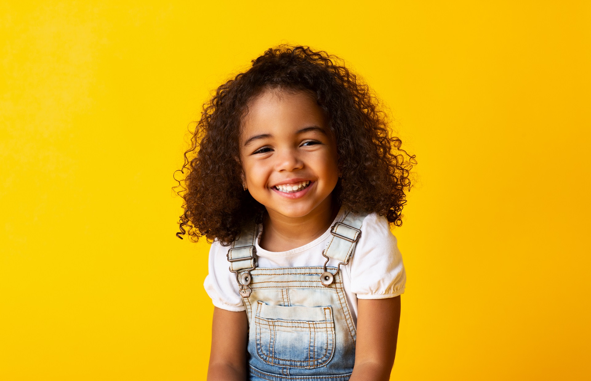 Portrait of a Smiling Young Girl | Family Lawyer | Hemmat Law Group