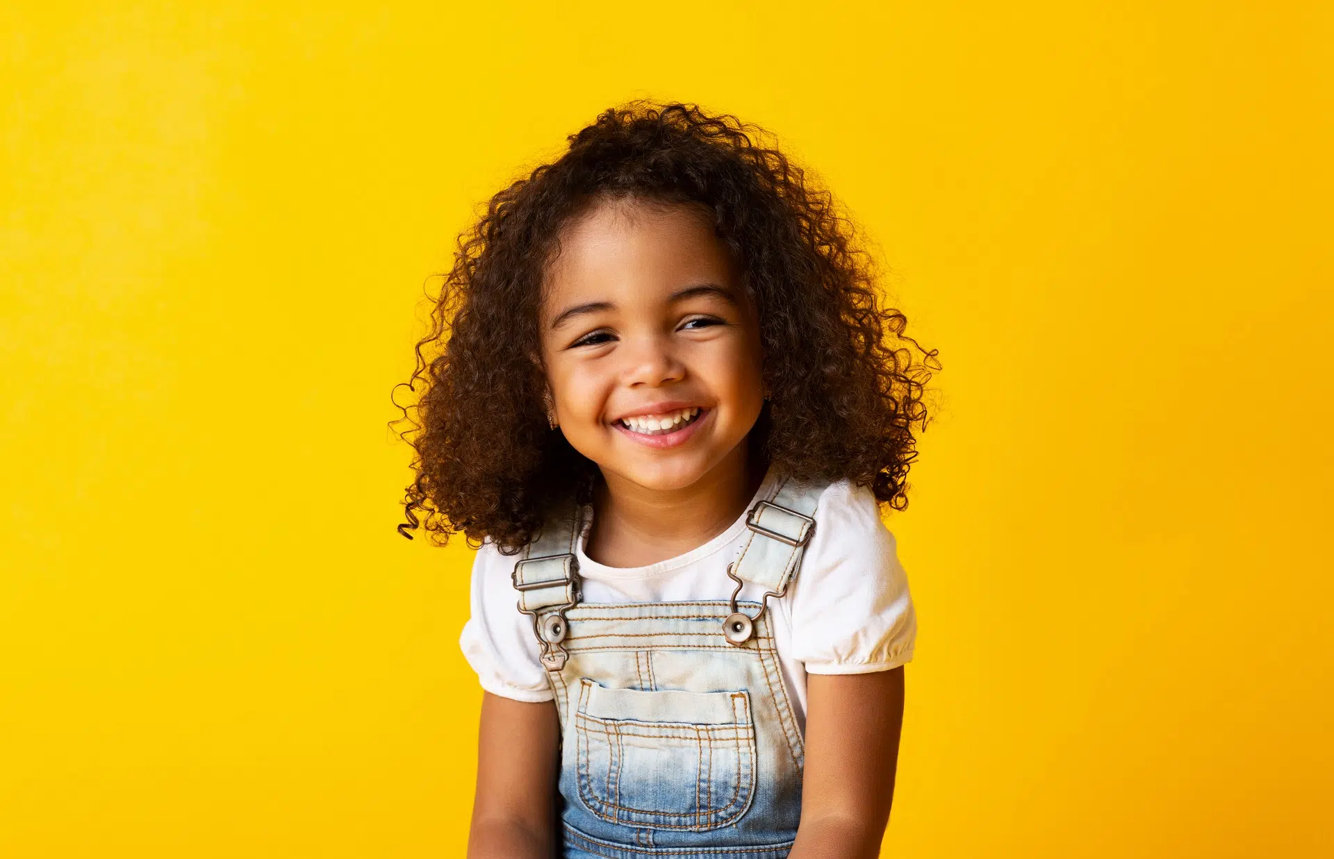 Portrait of a Smiling Young Girl | Family Lawyer | The Hemmat Law Group