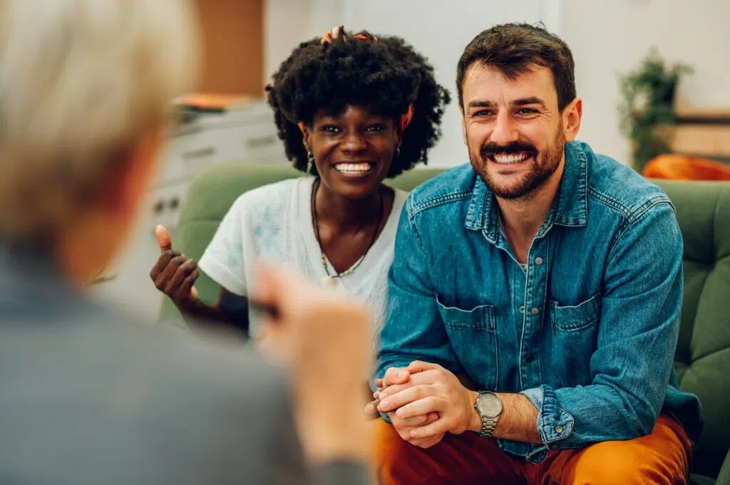 Two Individuals Sharing a Joyful Moment | Divorce Lawyer Seattle | The Hemmat Law Group