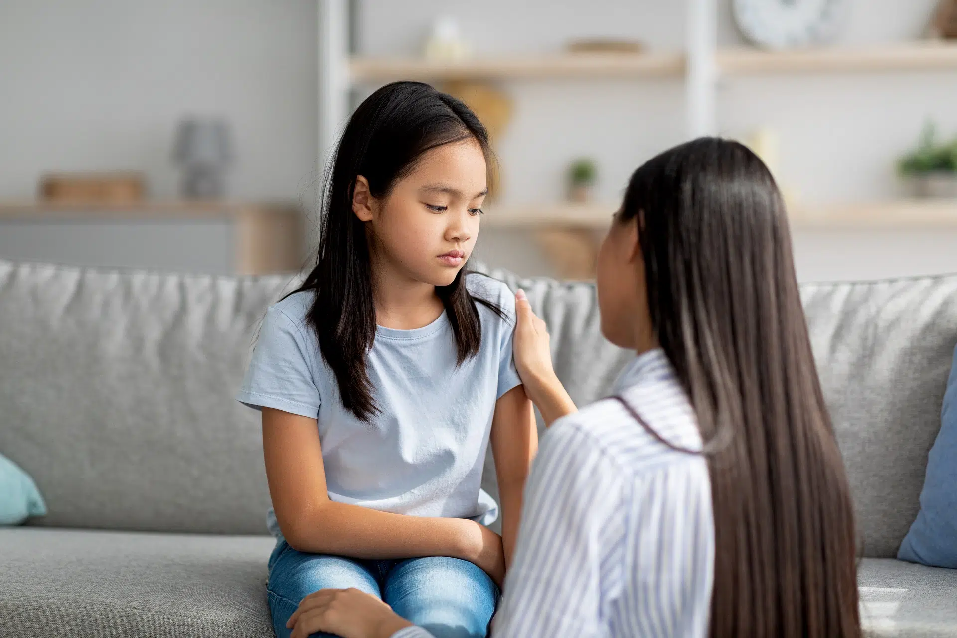 Adult woman comforting a younger person | Child Custody Lawyer | The Hemmat Law Group