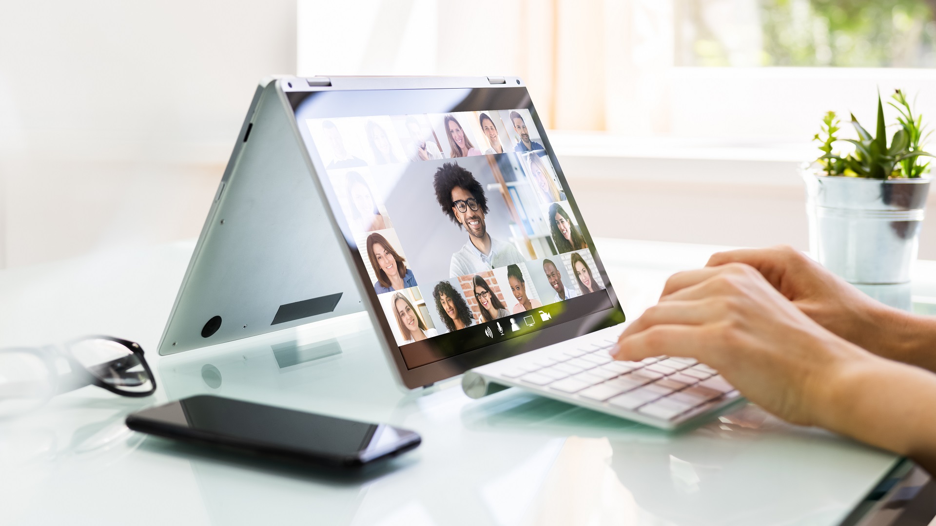 A person using a laptop for video chat | Expert Family Lawyers | Hemmat Law Group