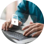 Hands typing password on a laptop with a padlock overlay | mediation services | The Hemmat Law Group