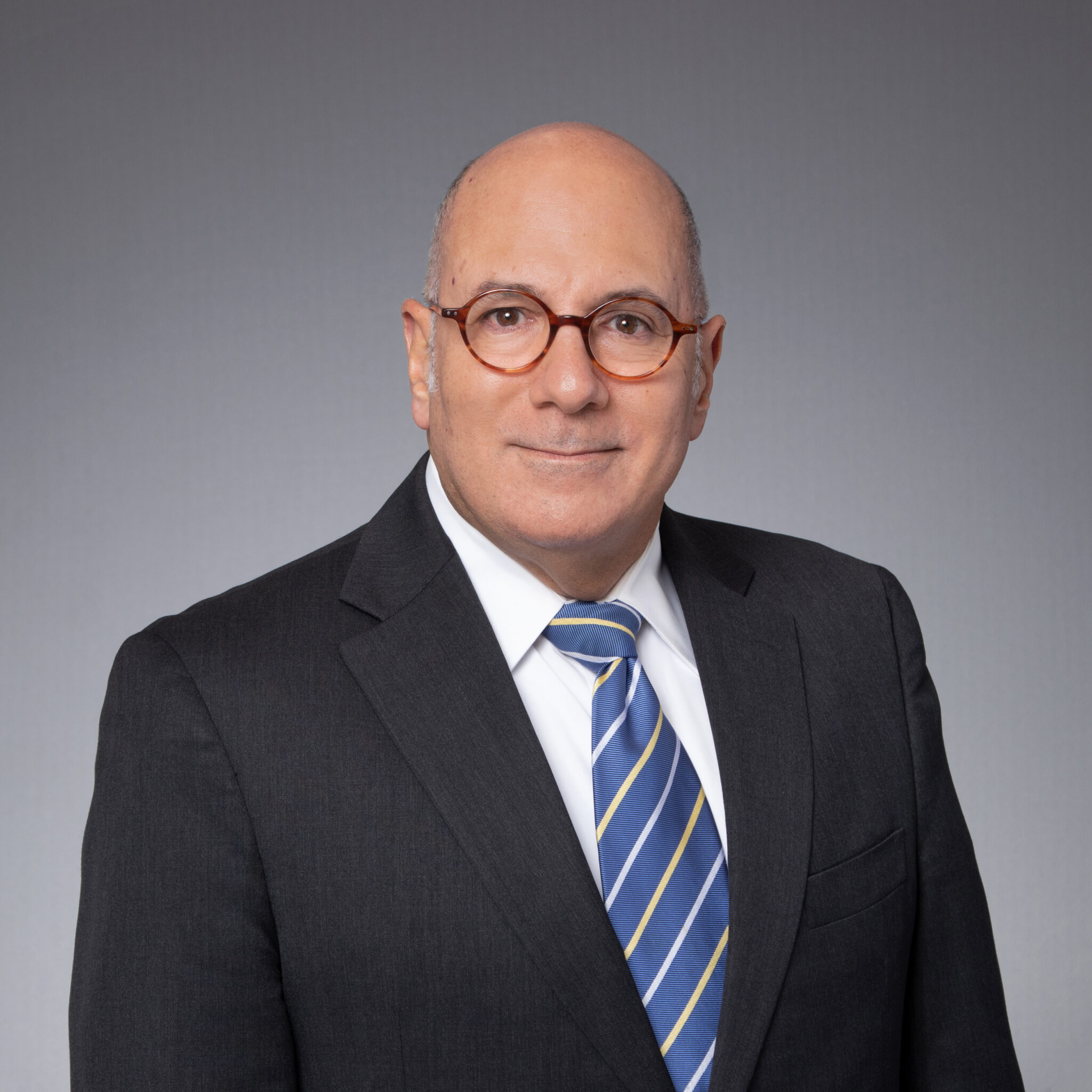 Professional headshot of Steven Hemmat in suit and tie | Hemmat Law Group