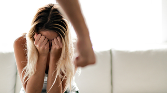 Woman experiencing threatening or intimidating behavior | Hemmat Law Group