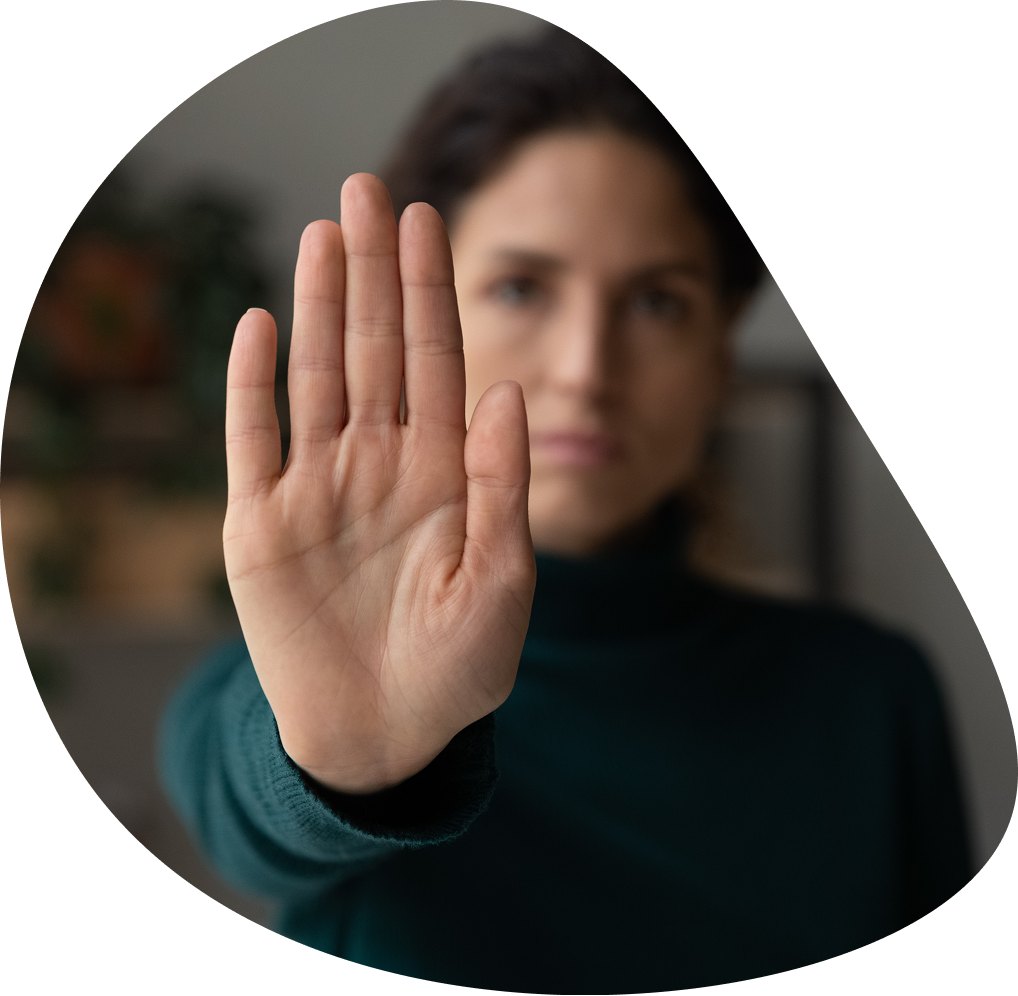Woman's raised palm, cutout stop gesture | Hemmat Law Group
