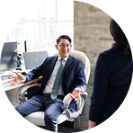 Attorney speaking with a client during an office consultation | Hemmat Law Group