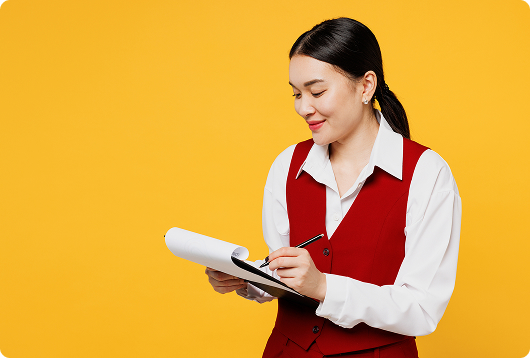 Professional woman taking notes against yellow background | Hemmat Law Group