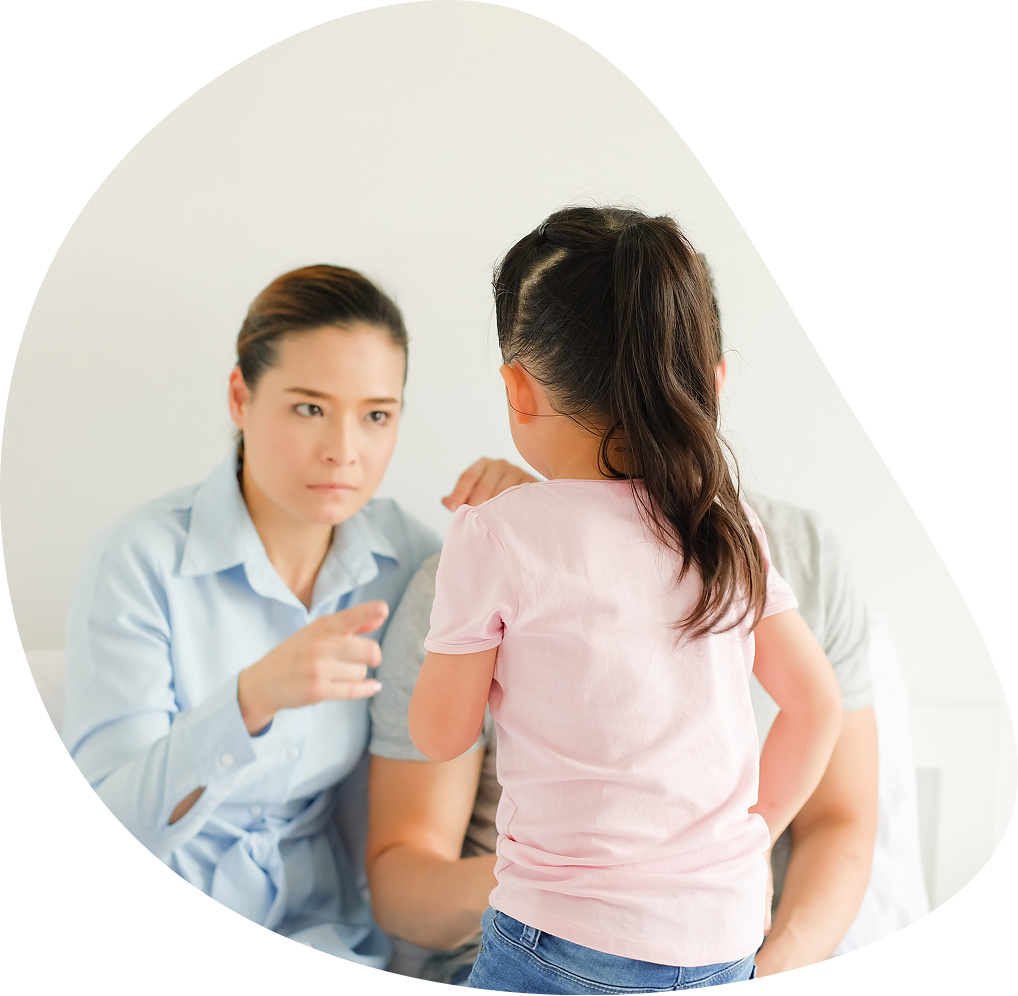 Mother sternly pointing while scolding girl | Hemmat Law Group