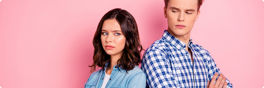 Frustrated couple standing back-to-back | Hemmat Law Group